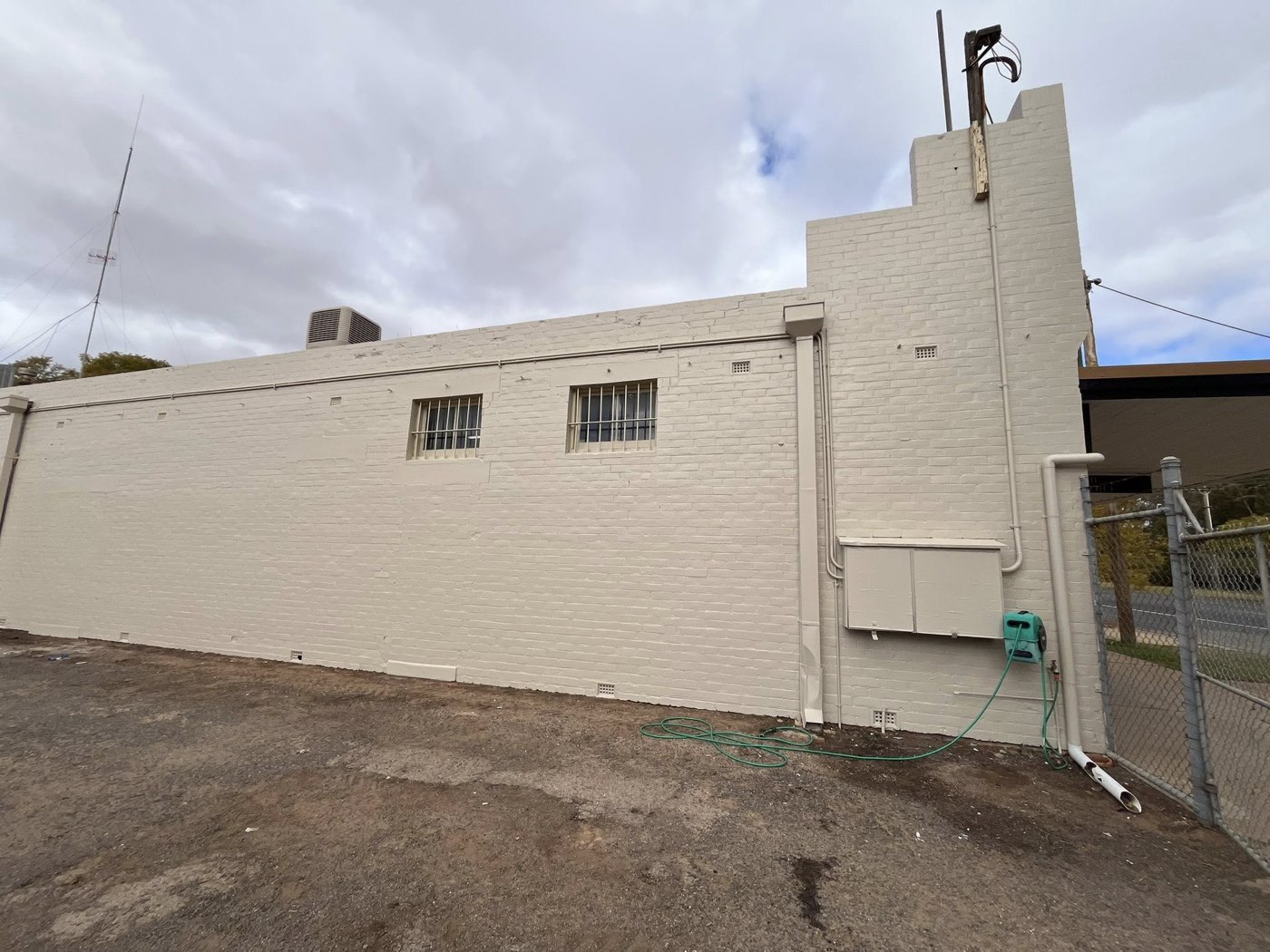 Large commercial building with full exterior repaint